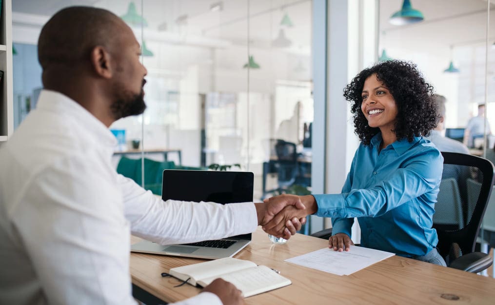 Two people shaking hands